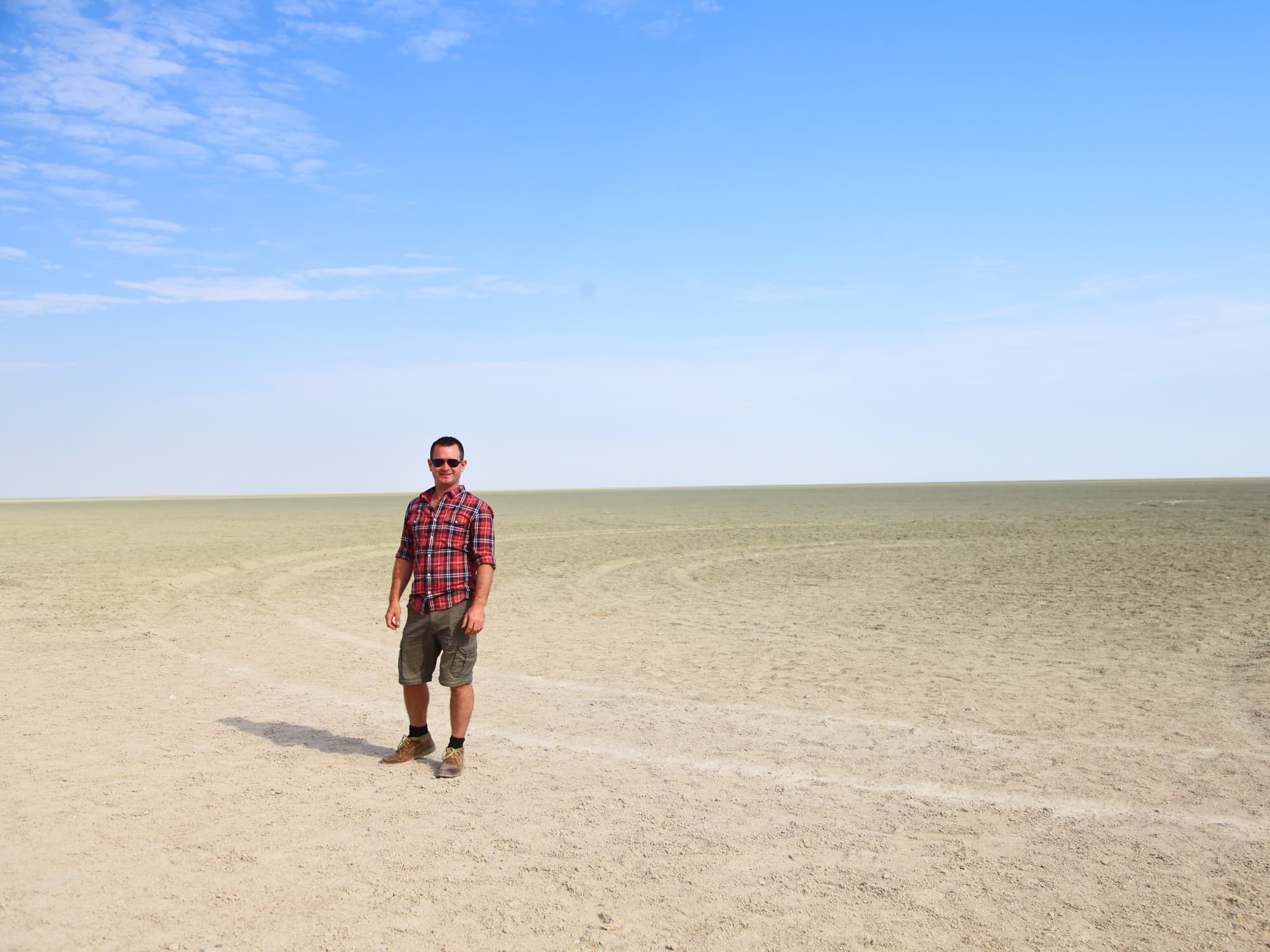 Standing in the desert in Namibia.