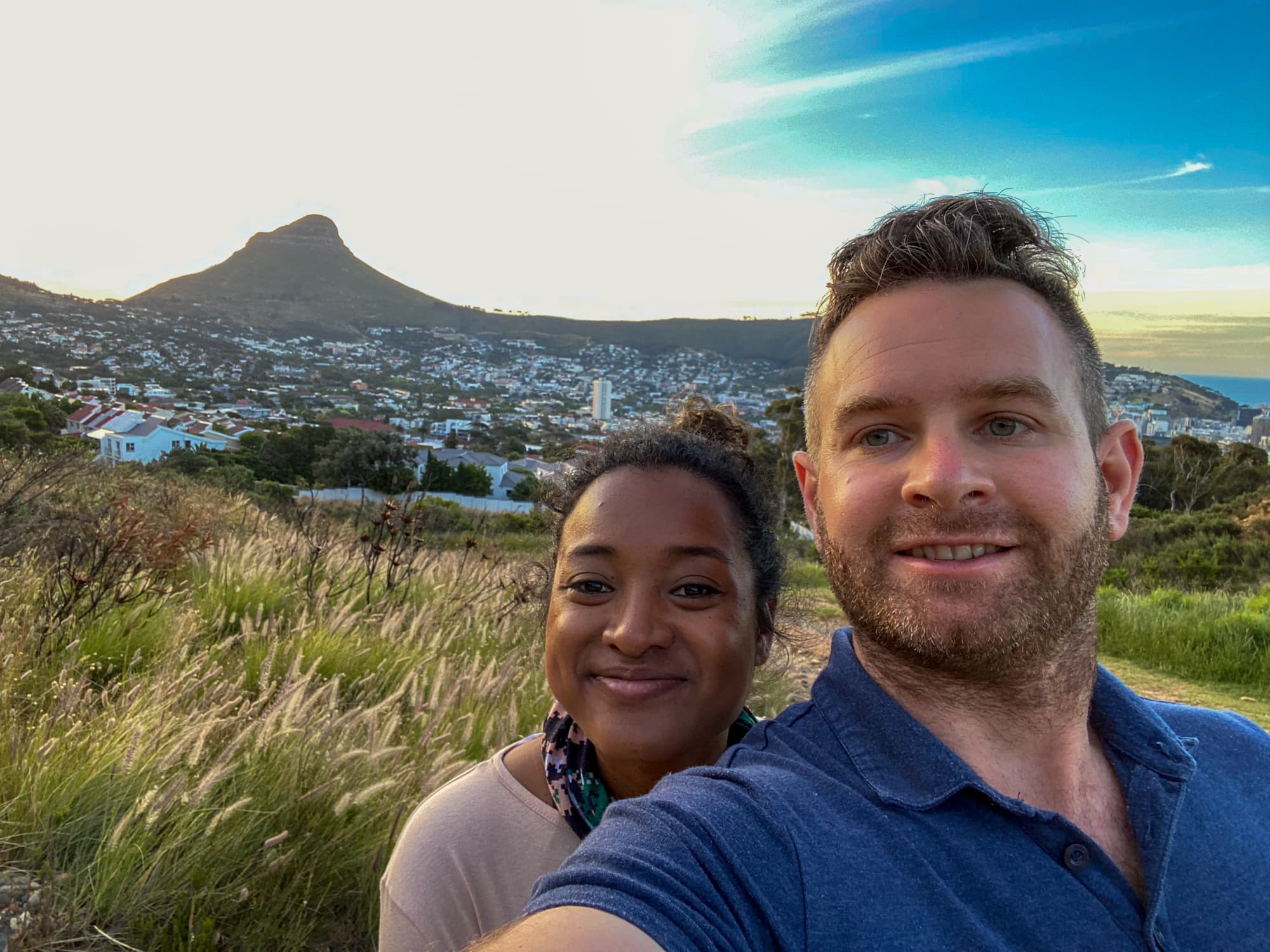 Hiking up the slopes of Table mountain with Lions-head in the background